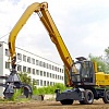 Пневмоколесный гидравлический экскаватор ЕК-18i